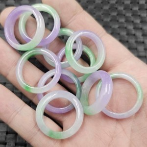 Purple jade ring with green accents