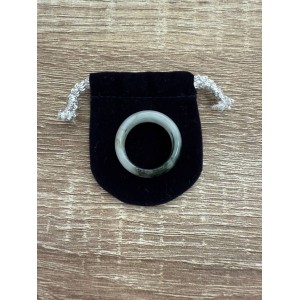 White jade ring with green accents