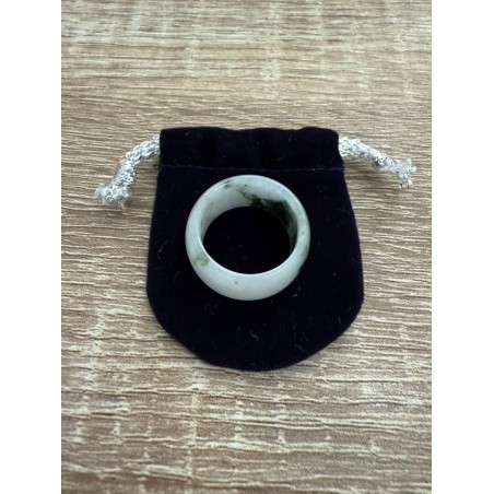 White jade ring with green accents