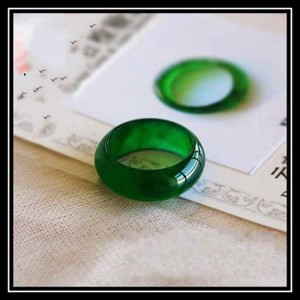 Emerald jade ring, a symbol of stability, sustainability and immortality.